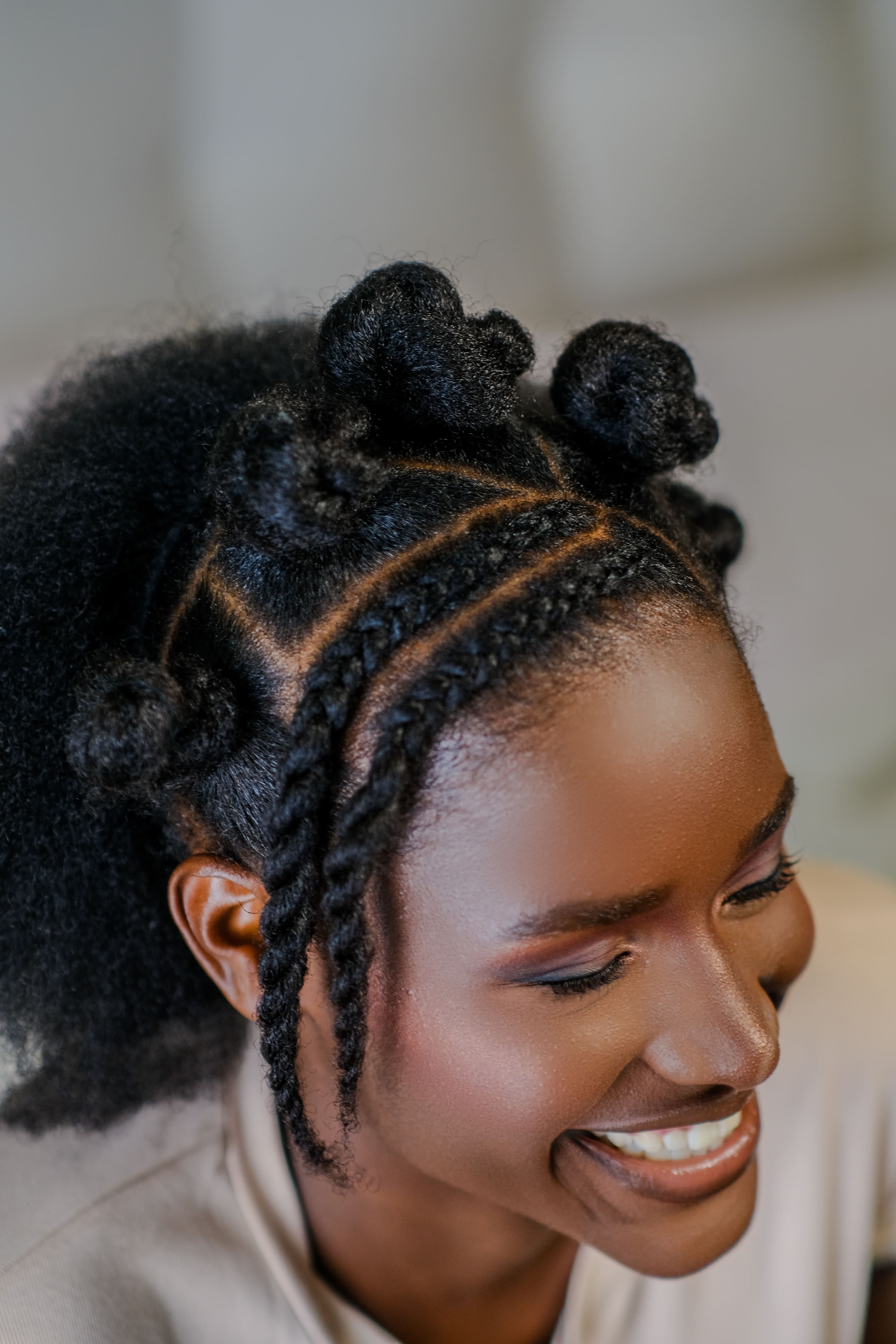 Close-up of textured hair styled with Apmo